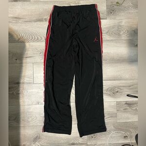 Jordan Black Track Pants with Red & White Side Stripes